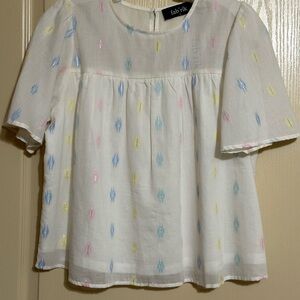 Pretty top from Fabrik NWT. Size small. White and lined.